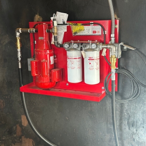 Wall mount filtration system installed on an industrial wall